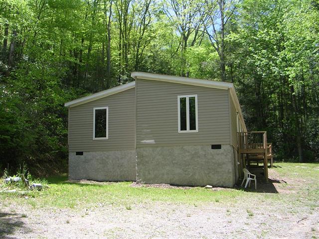 A picture of the property located at 47 LOVETT FALLS LN, FAIRVIEW NC 28730.