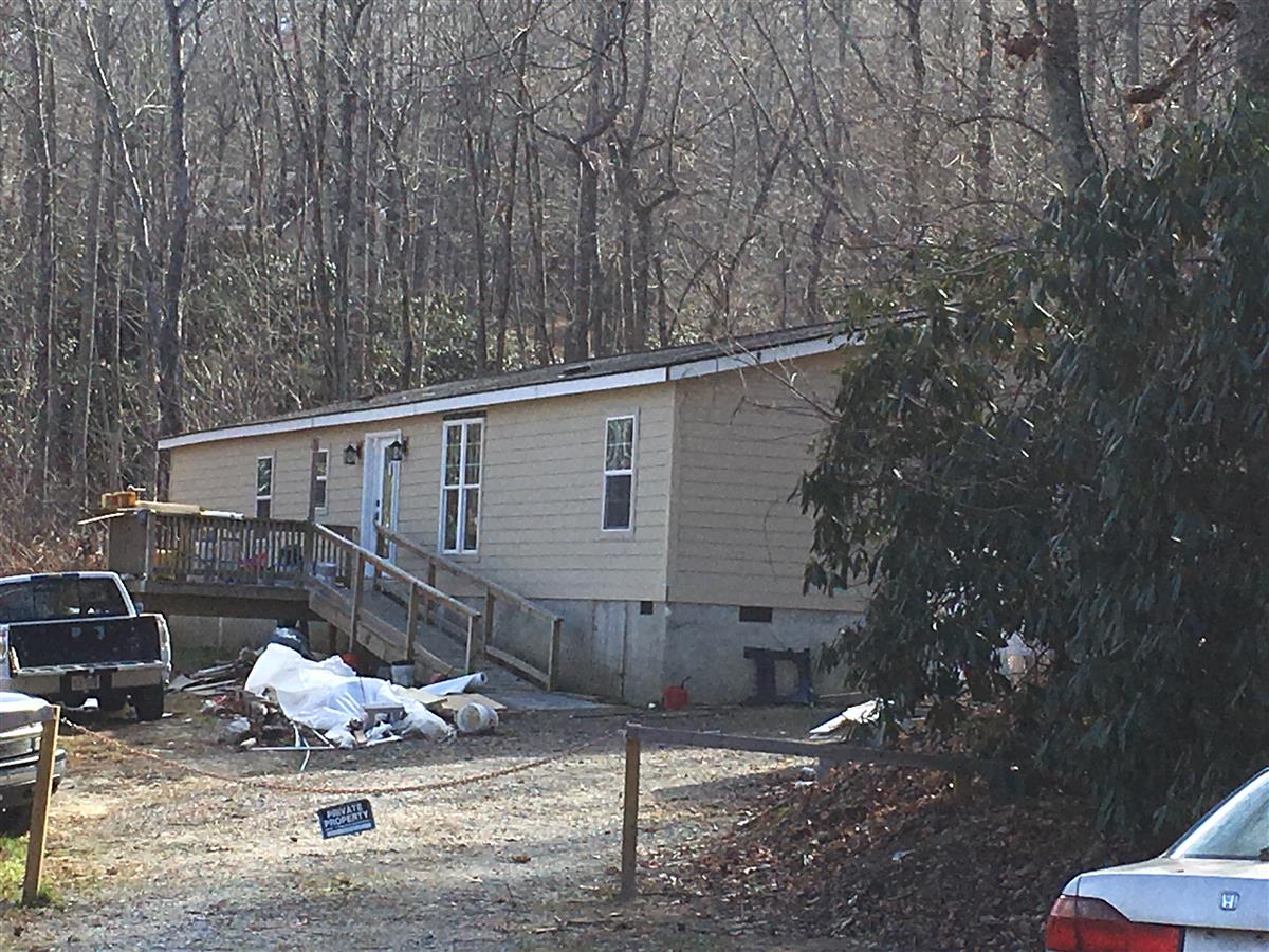 A picture of the property located at 40 LOVETT FALLS LN, FAIRVIEW NC 28730.