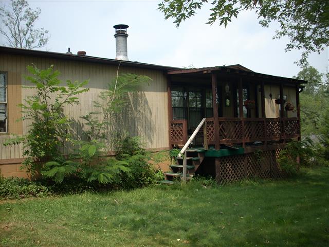 A picture of the property located at 115 PARADISE COURT LN, CANDLER NC 28715.