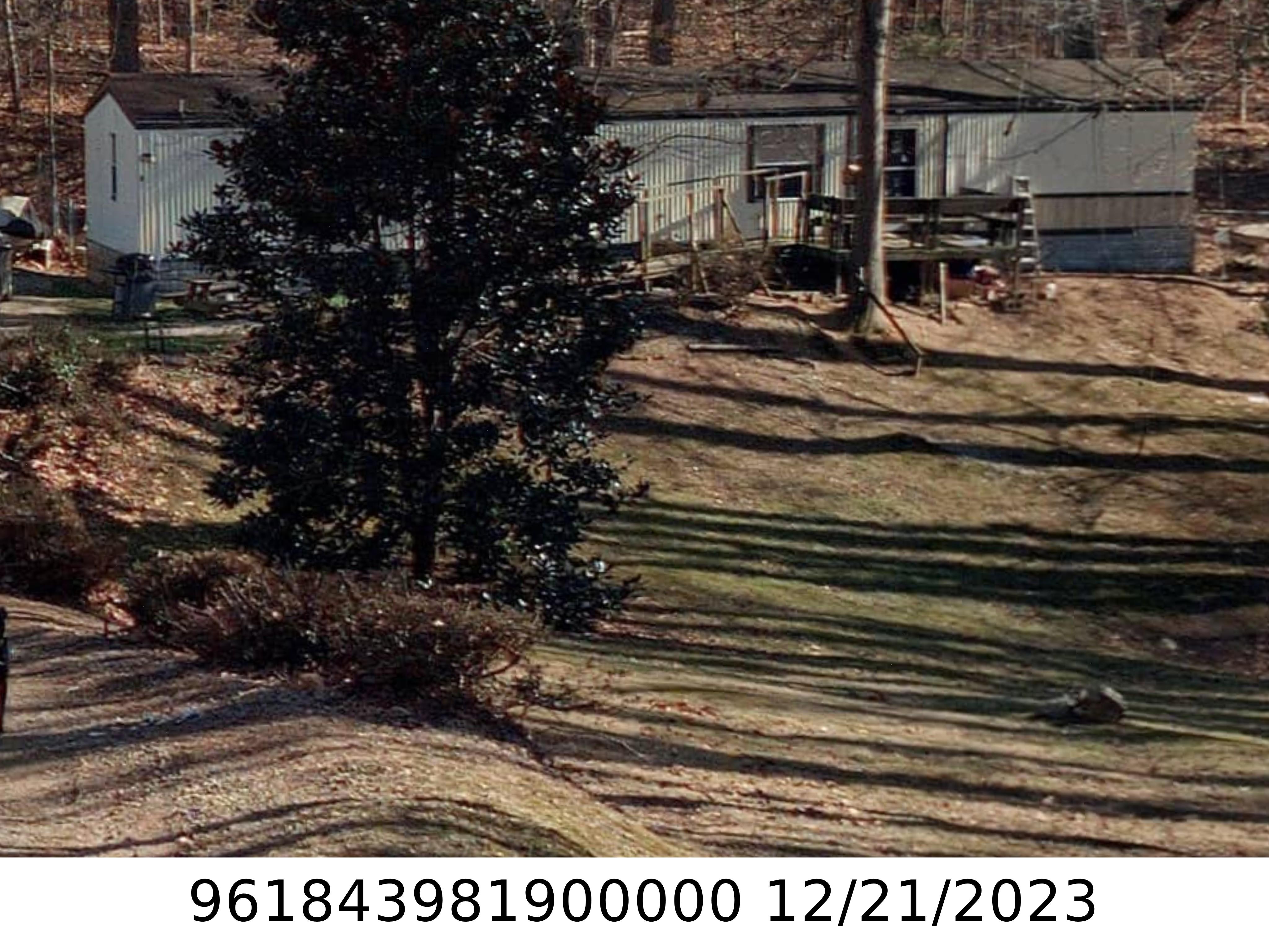 A picture of the property located at 23 BLACKBERRY LN, CANDLER NC 28715.