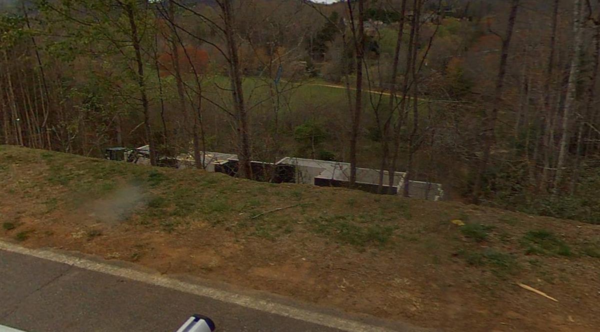 A picture of the property located at 15 BEAR FLOWER TRL, ARDEN NC 28704.