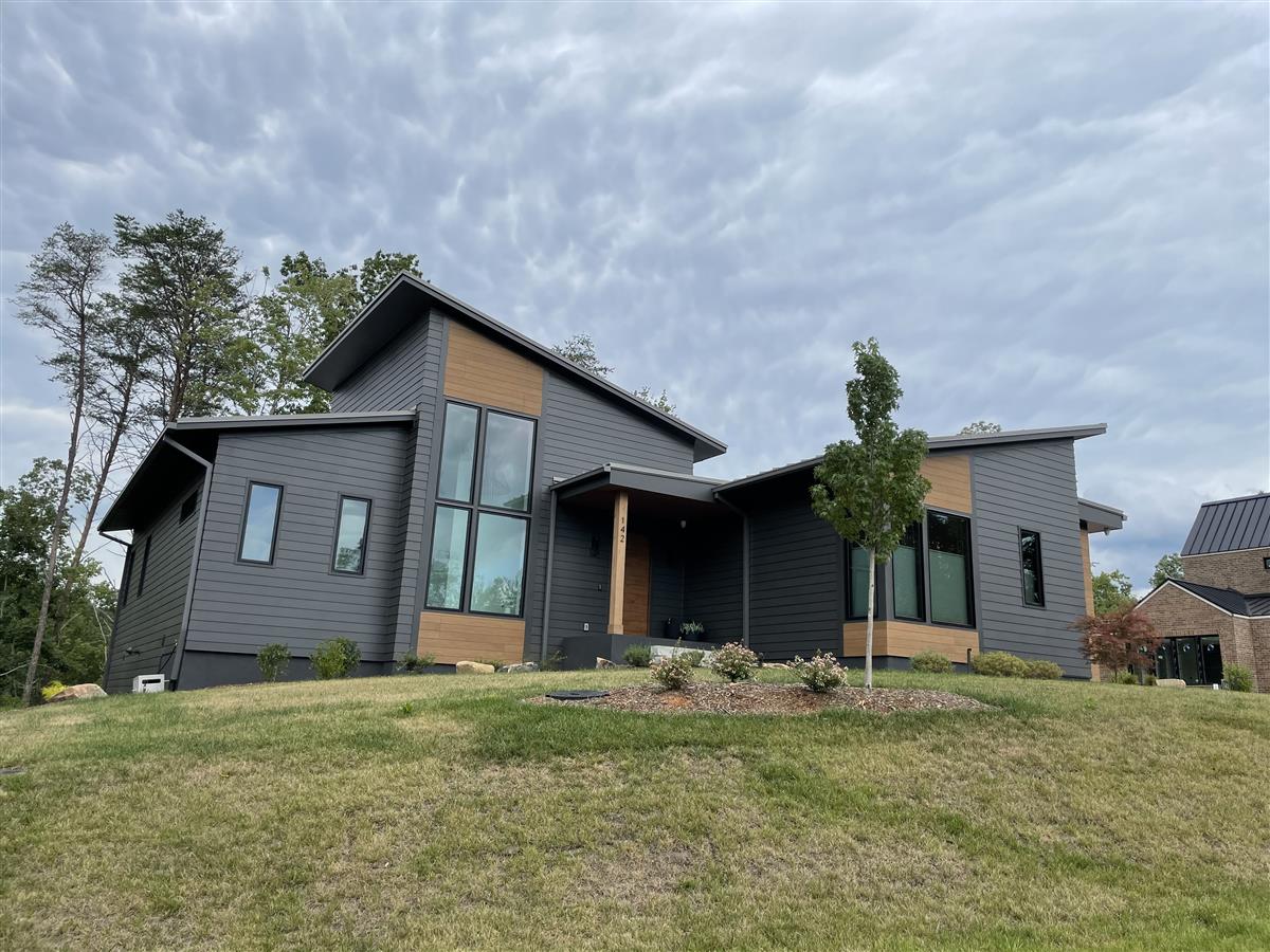 A picture of the property located at 142 RIVERBEND FOREST DR, ASHEVILLE NC 28805.
