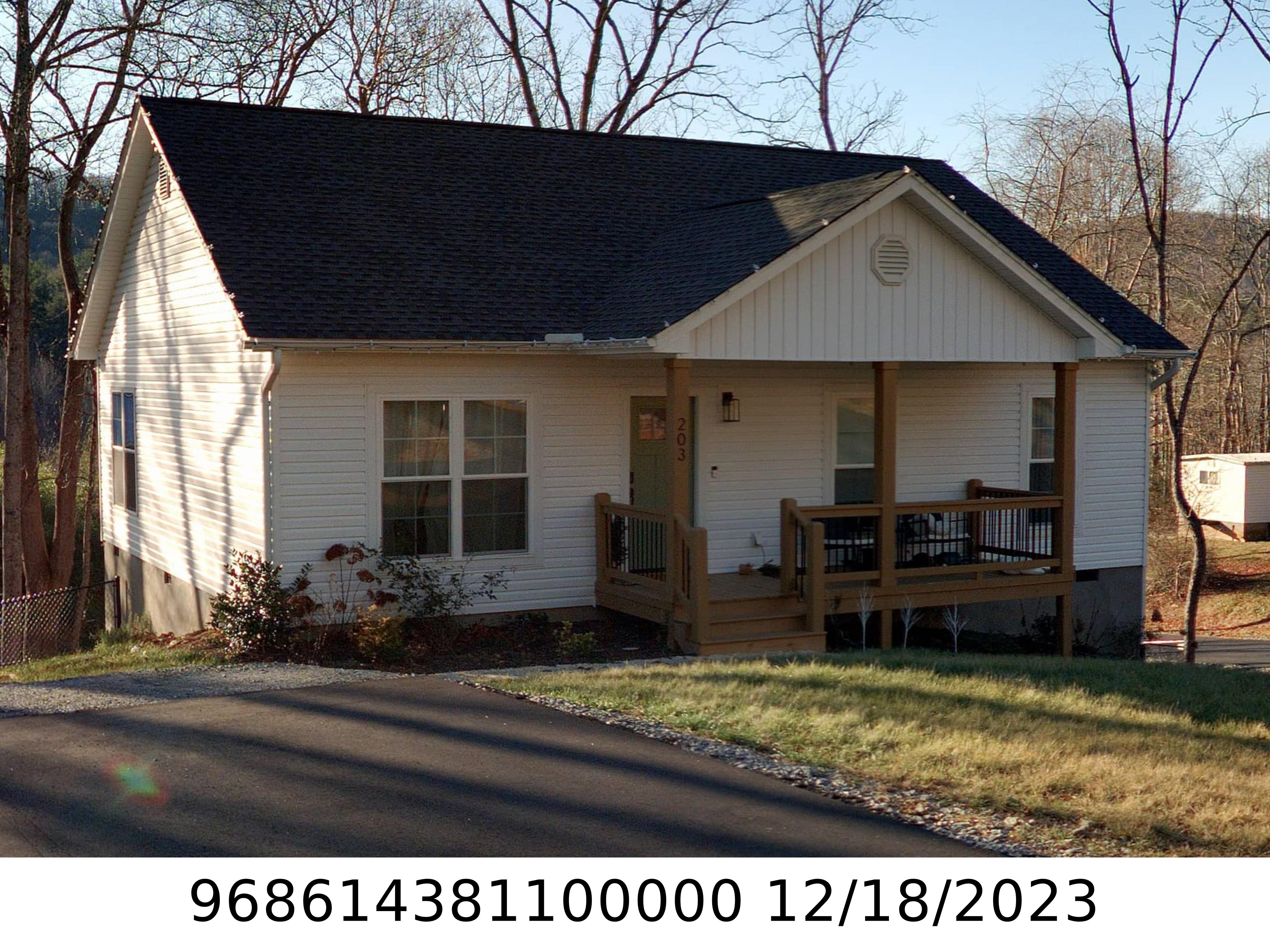A picture of the property located at 203 FALL LEAVES DR, FAIRVIEW NC 28730.