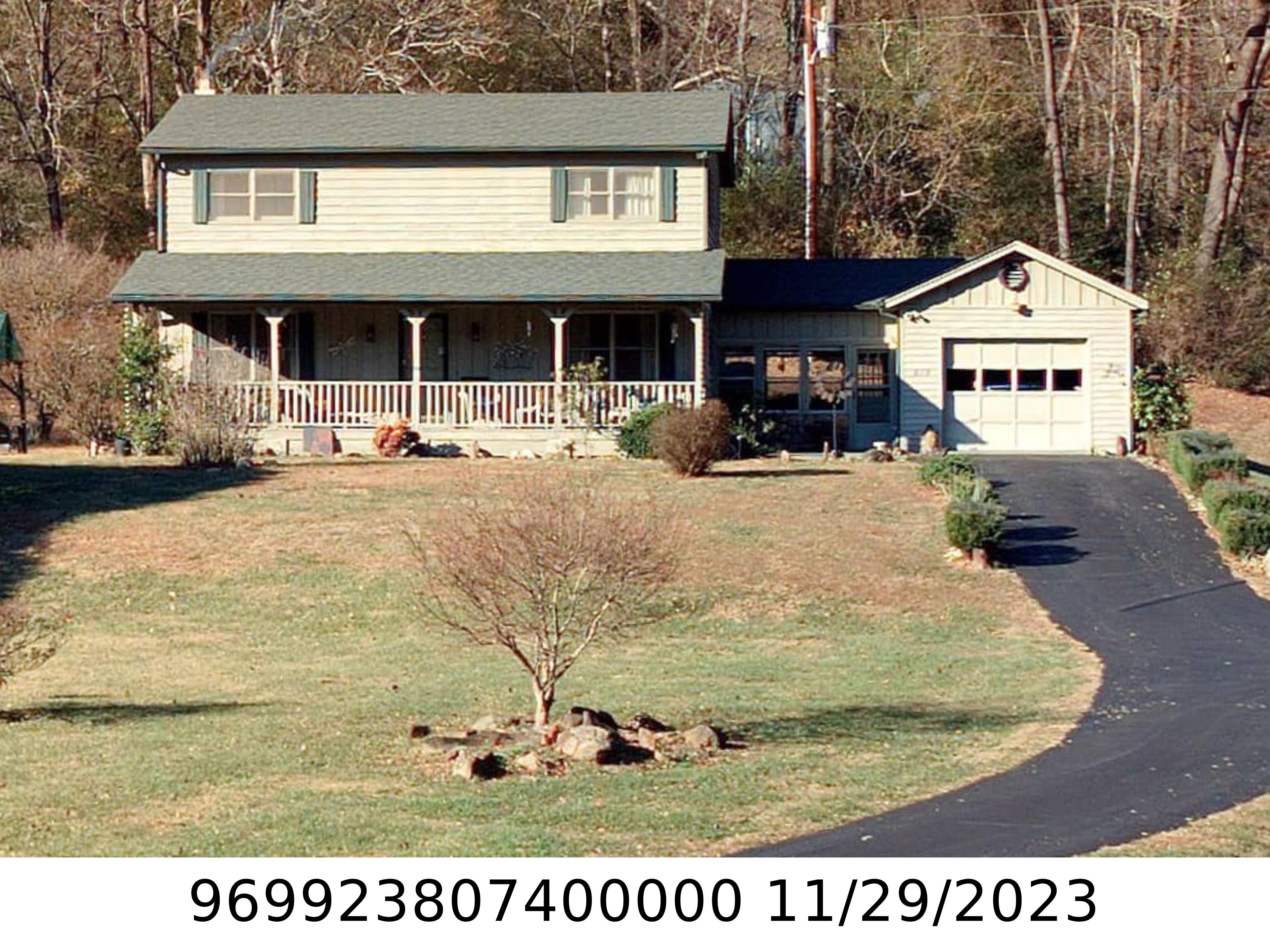 A picture of the property located at 215 GROVEMONT AVE, SWANNANOA NC 28778.