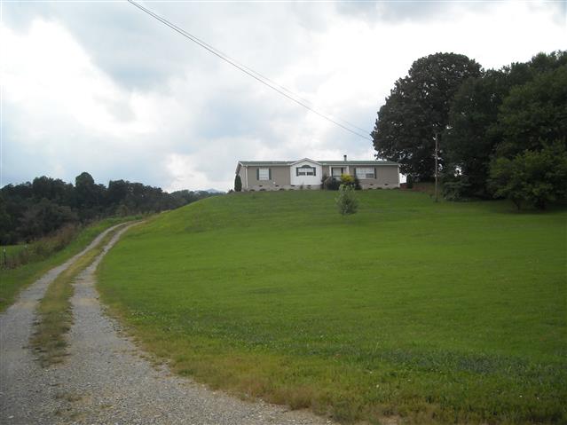 A picture of the property located at 11 GOLDEN MEADOW LN, LEICESTER NC 28748.