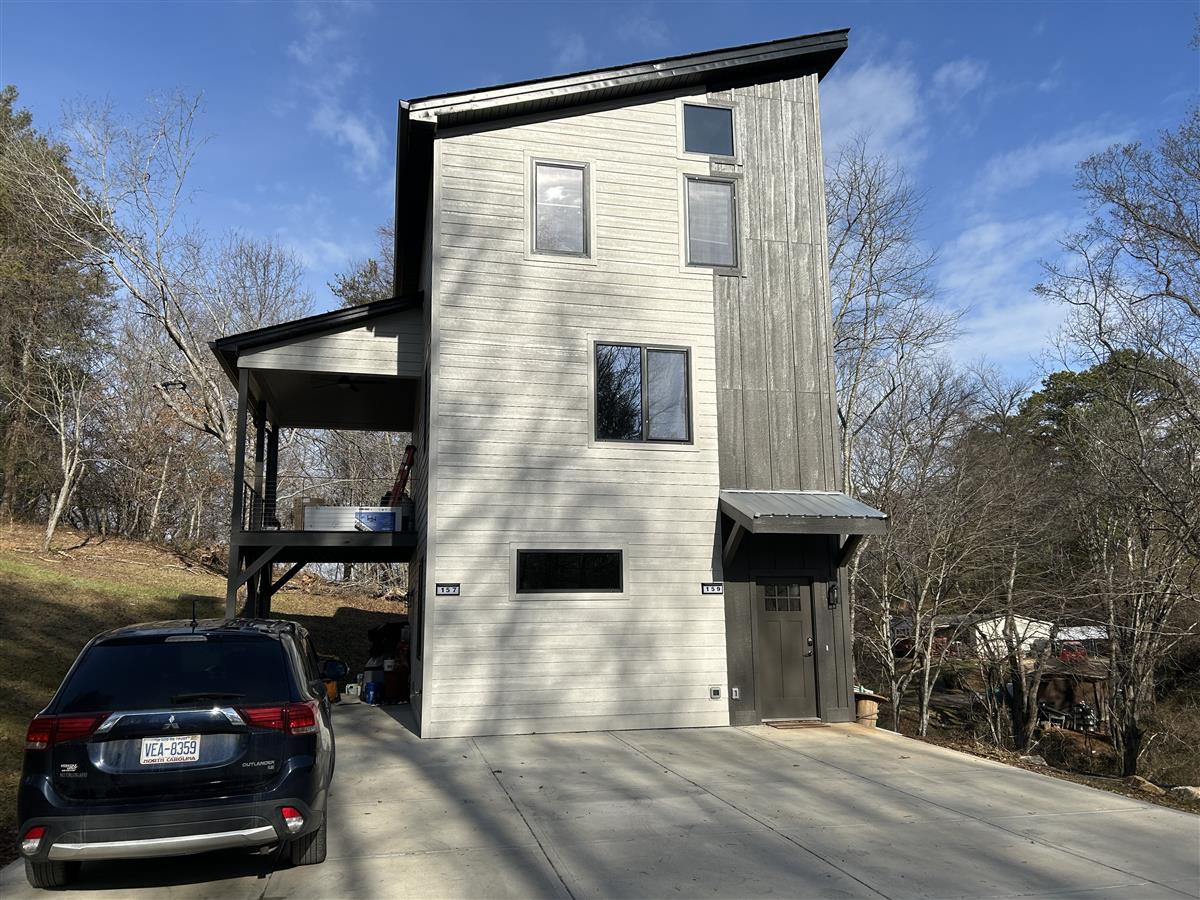 A picture of the property located at 157 BLESSED VALLEY RD, ASHEVILLE NC 28806.