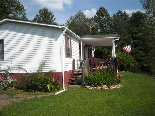 A picture of the property located at 94 FISHER KNOLL LN, ALEXANDER NC 28701.