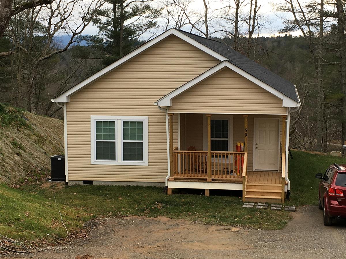 A picture of the property located at 59 INDIAN PAINTBRUSH LN, ALEXANDER NC 28701.