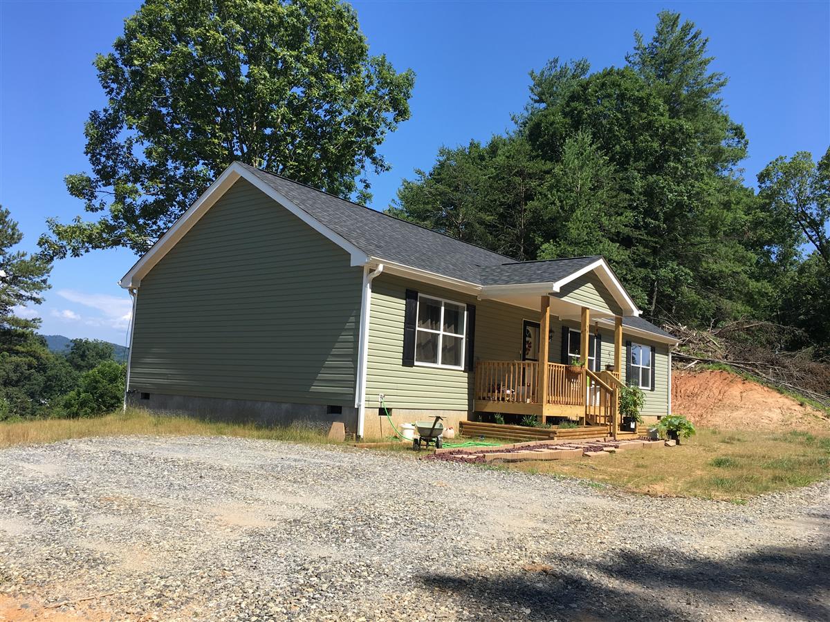 A picture of the property located at 54 INDIAN PAINTBRUSH LN, ALEXANDER NC 28701.