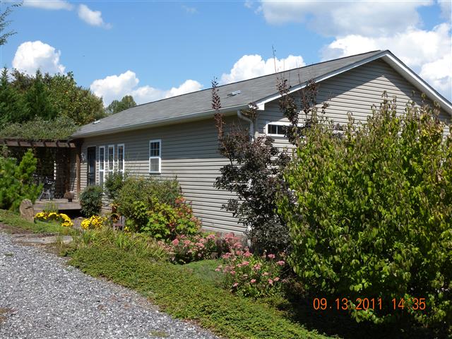 A picture of the property located at 663 FLINT HILL RD, ALEXANDER NC 28701.