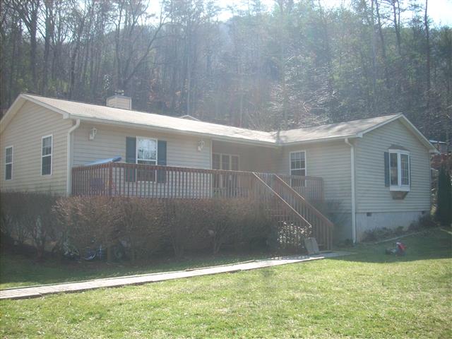 A picture of the property located at 115 BLACK BEAR COVE DR, ASHEVILLE NC 28805.
